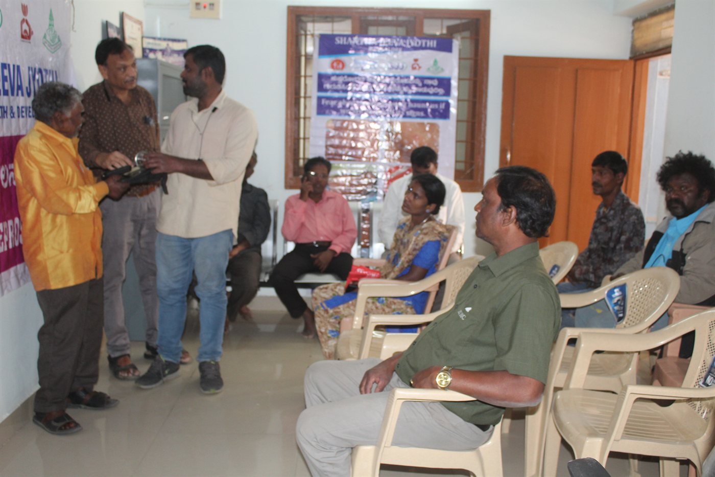 Beneficiaries receiving protective footwear and self-care kits
